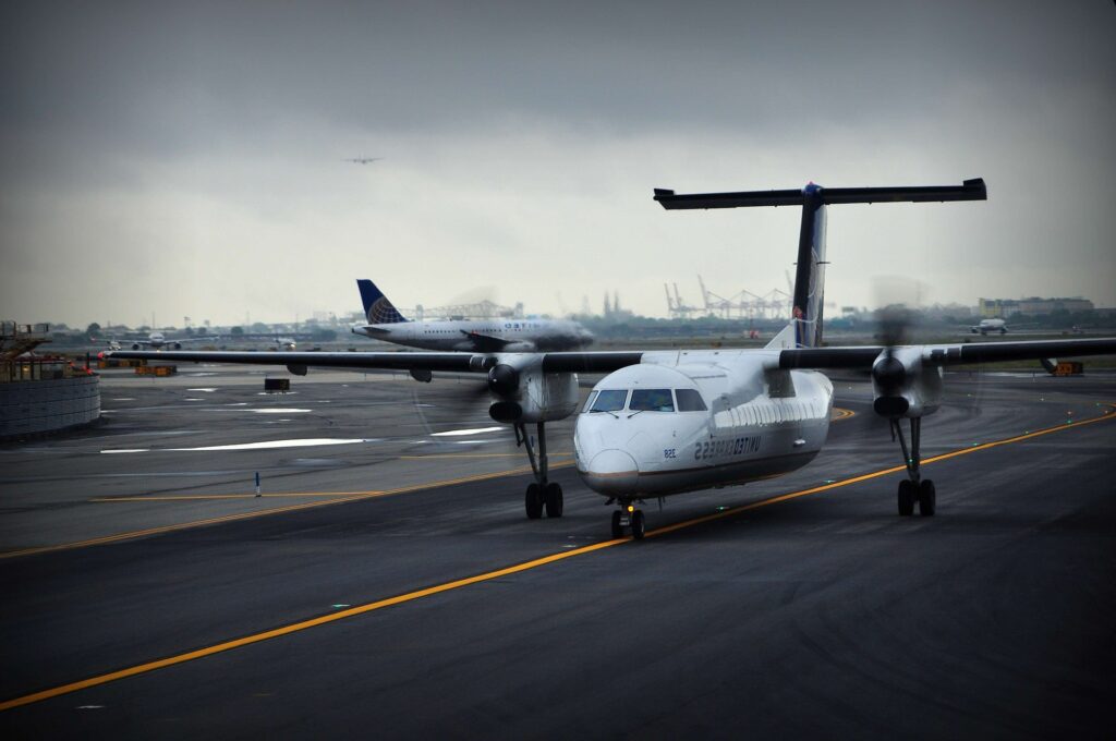 propeller aircraft taxing on a runway
